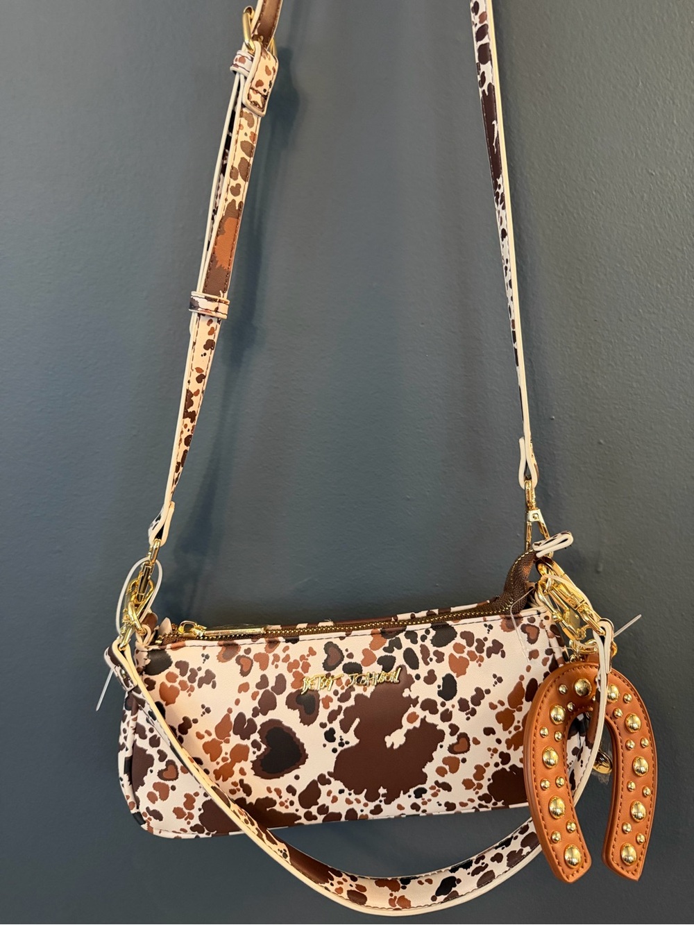 Betsey Johnson Brown and White Cow Print Shoulder Bag with Gold Hardware